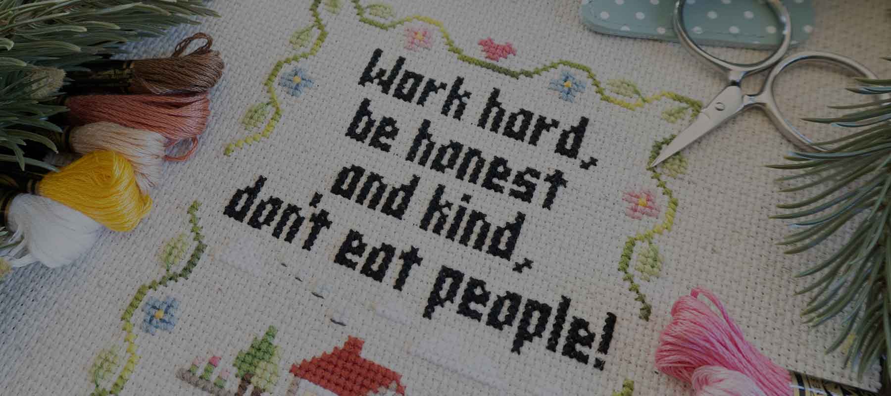 "Don't Eat People": A Custom Cross-Stitch Family Motto with a Touch of Tradition